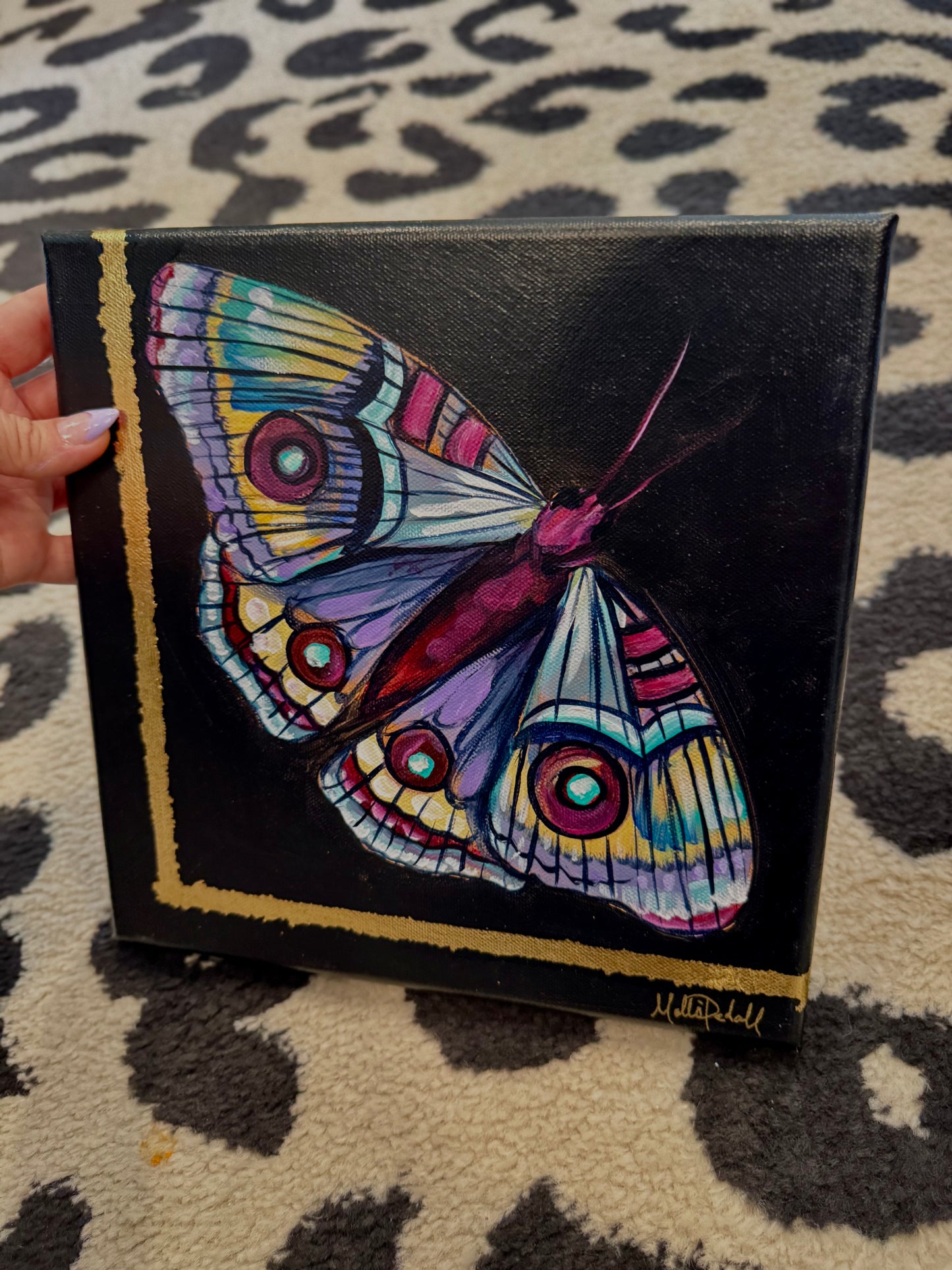 Magenta moth