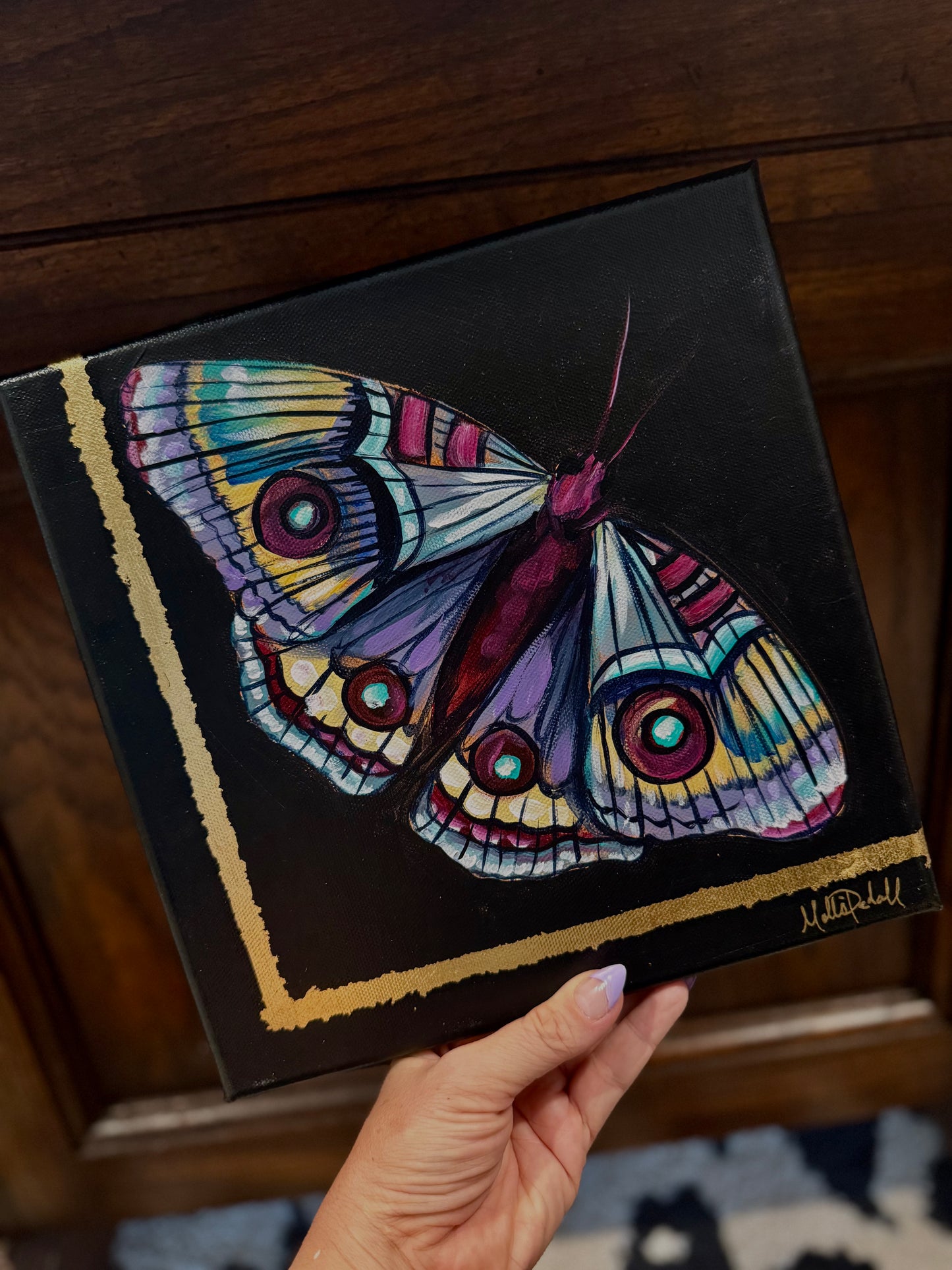 Magenta moth